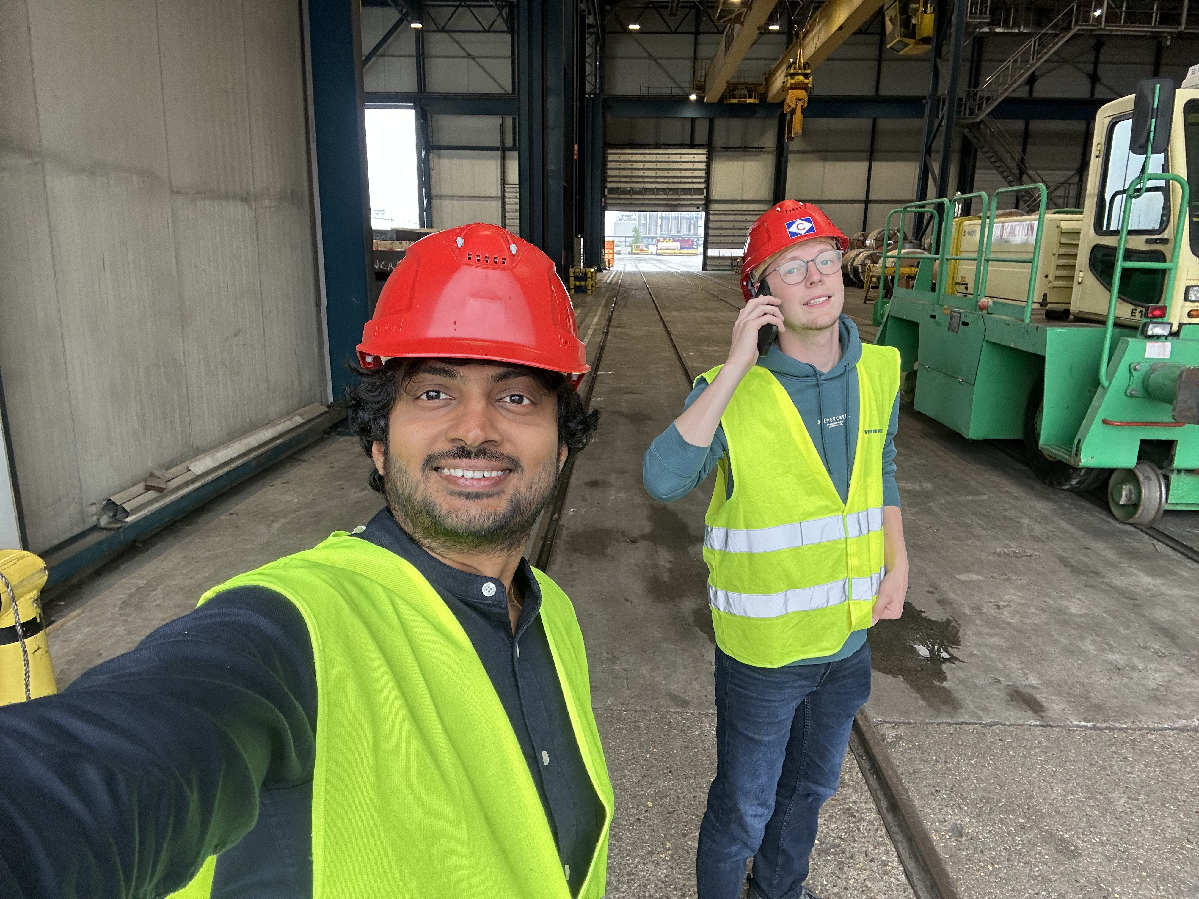 Meeting room discussion with printed workflow papers